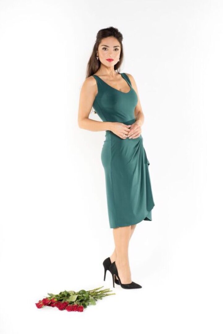 Model with portfolio teal colored tango dress