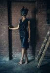 Image of black sequin tango dress and a hair cap