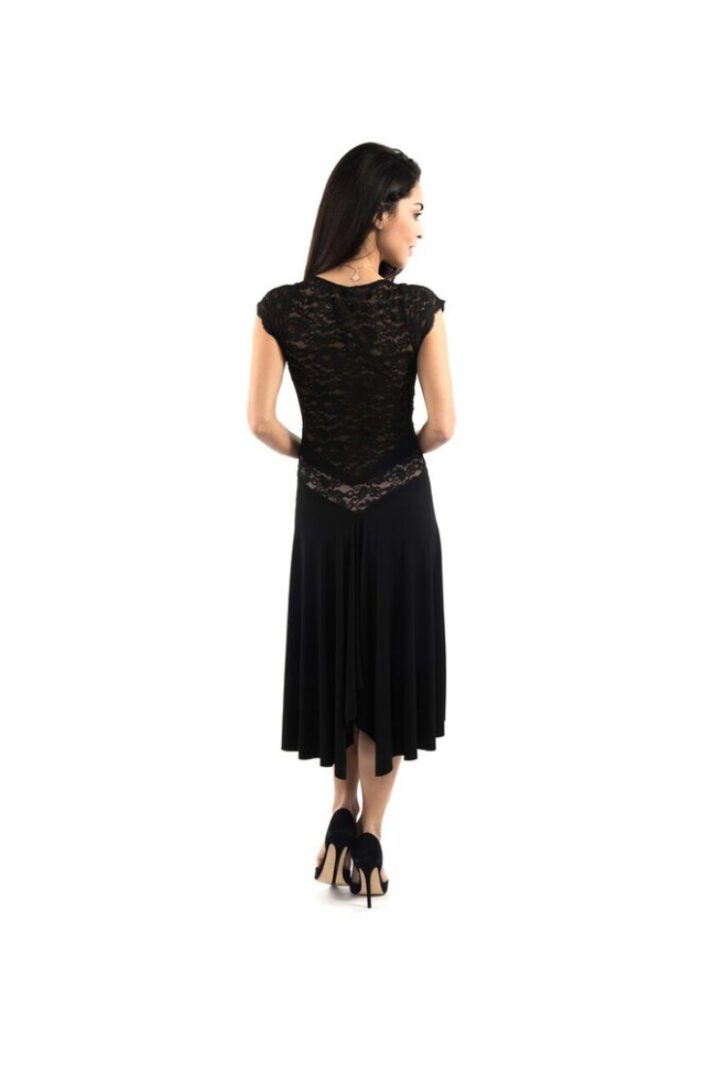 The backside of a black lace dress