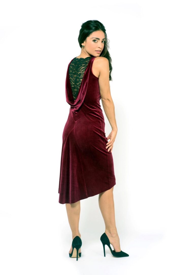 A red draped back tango dress velvet
