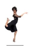 A woman dances in her black tango dress