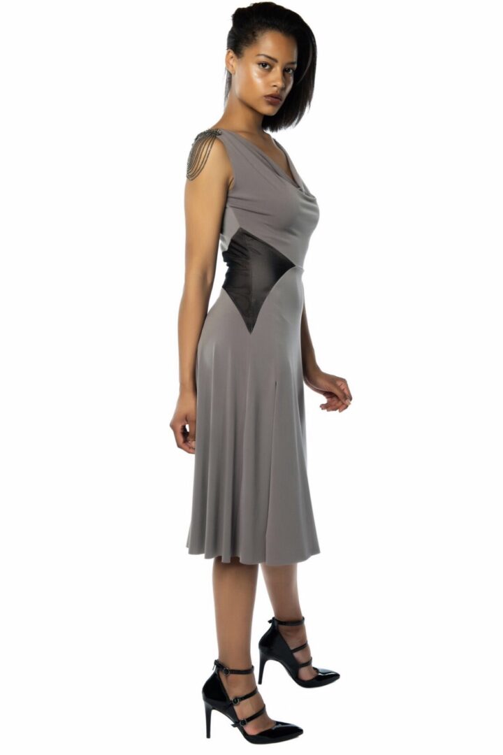 A grey verona tango dress draped neckline