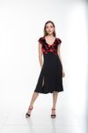 A gorgeous v tango dress with a red and black devore