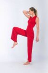 A woman posing in a red Tango apparel